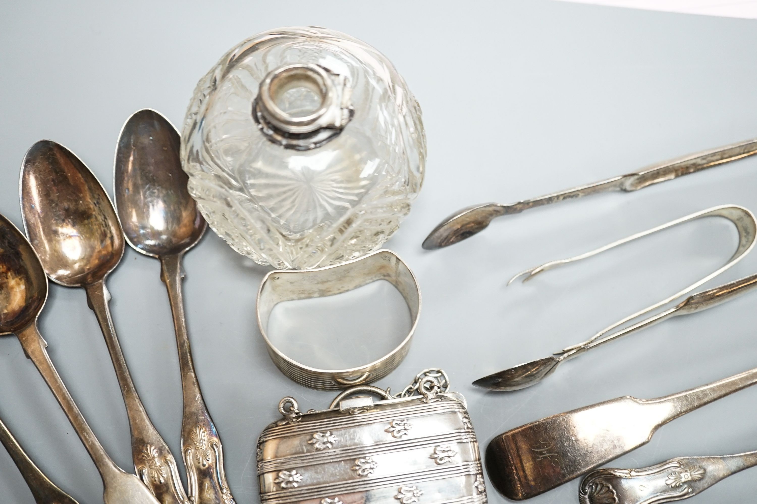 An 18th century silver toddy ladle, with wooden handle(a.f.) and a group of small silver including flatware, napkin ring, scent bottle, repousse box and cover and purse.